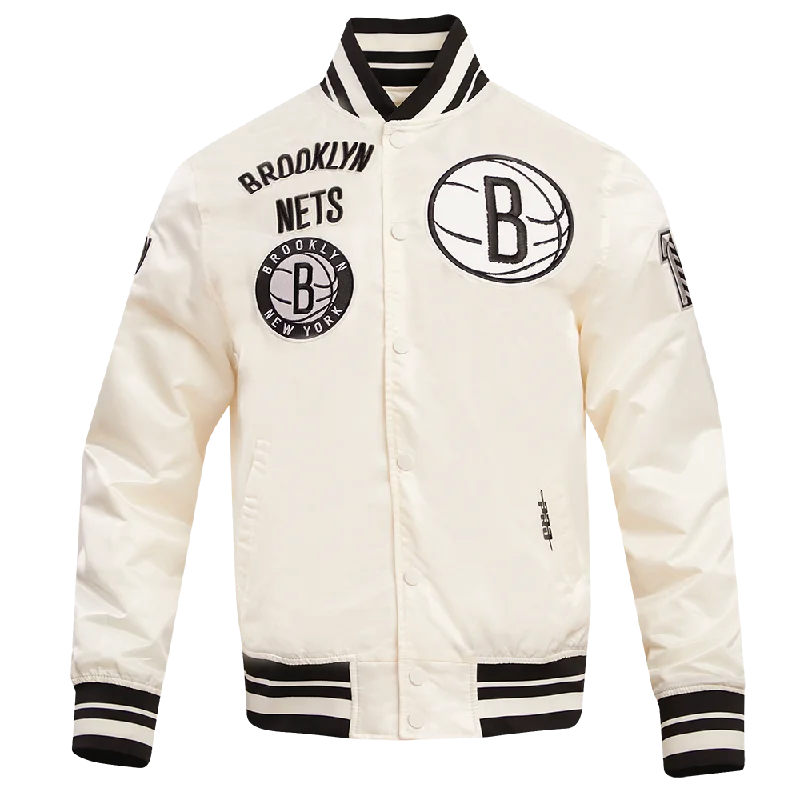 men's cargo jackets -NBA BROOKLYN NETS RETRO CLASSIC MEN'S RIB SATIN JACKET (EGGSHELL/ BLACK)